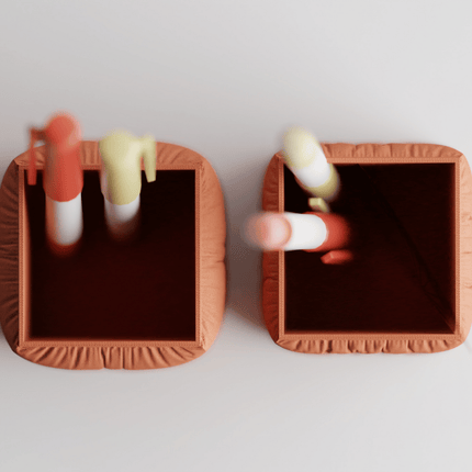 Orren – suport pentru instrumente de scris cu design moale tip pernă