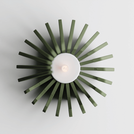 Olyra – suport tealight sculptural în formă de flacără