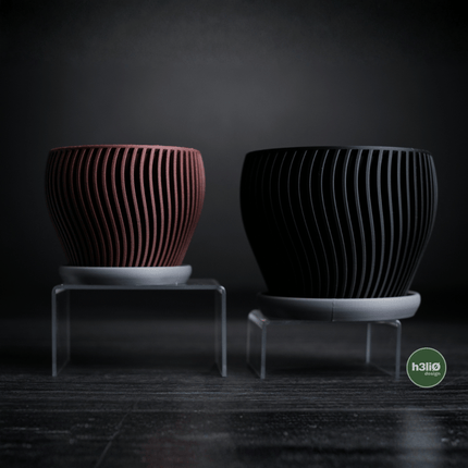 Elvo | ghiveci decorativ cu formă fluidă și bază integrată