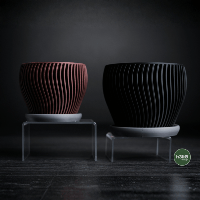 Elvo | ghiveci decorativ cu formă fluidă și bază integrată