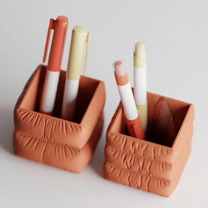 Orren – suport pentru instrumente de scris cu design moale tip pernă