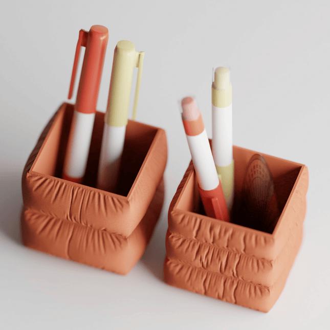 Orren – suport pentru instrumente de scris cu design moale tip pernă