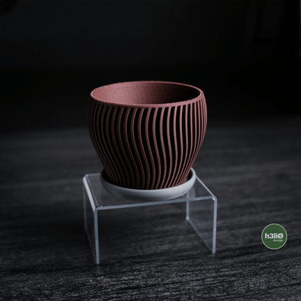 Elvo | ghiveci decorativ cu formă fluidă și bază integrată