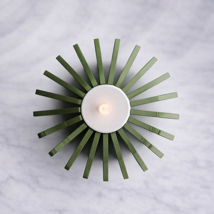 Olyra – suport tealight sculptural în formă de flacără