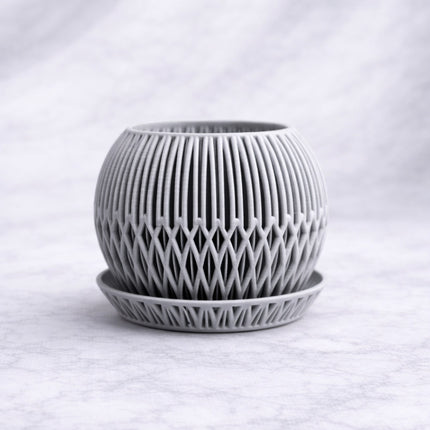 Alva | ghiveci decorativ sculptural cu bază integrată